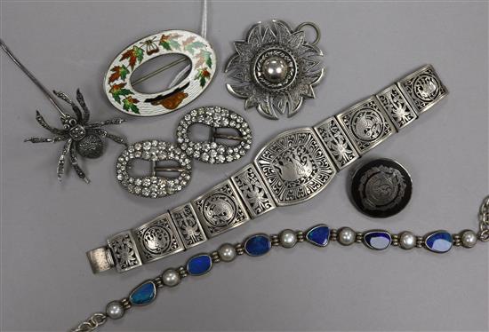 Mixed bijouterie including silver and enamel brooch, silver and gem set necklace and two paste set buckles.